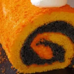 Rulltårta i orange och svart till halloween